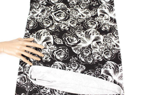 Black and White Skulls and Floral Print Knit Jersey Fabric by Lauren Moshi by the yard