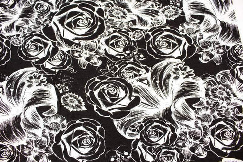 Black and White Skulls and Floral Print Knit Jersey Fabric by Lauren Moshi by the yard