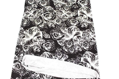 Black and White Skulls and Floral Print Knit Jersey Fabric by Lauren Moshi by the yard