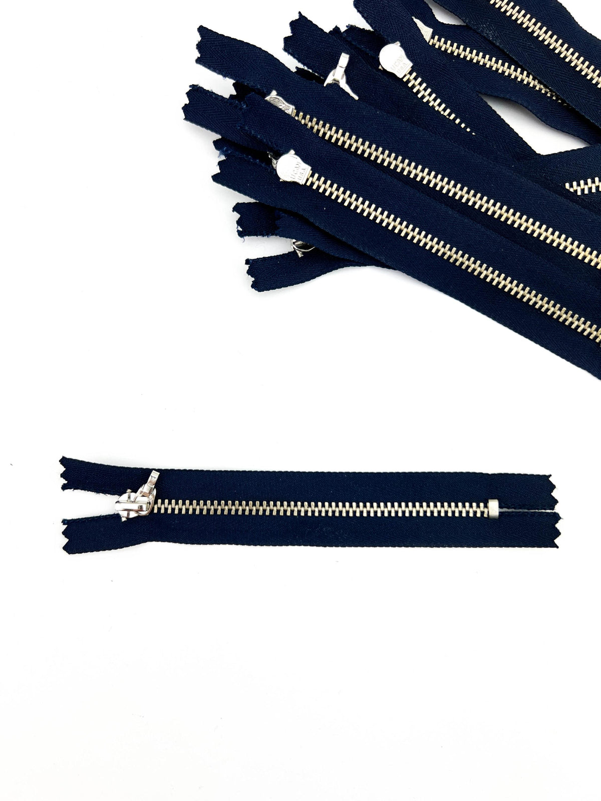 Navy blue 5 inch zippers with nickel metal teeth and no pulls, 13 pack
