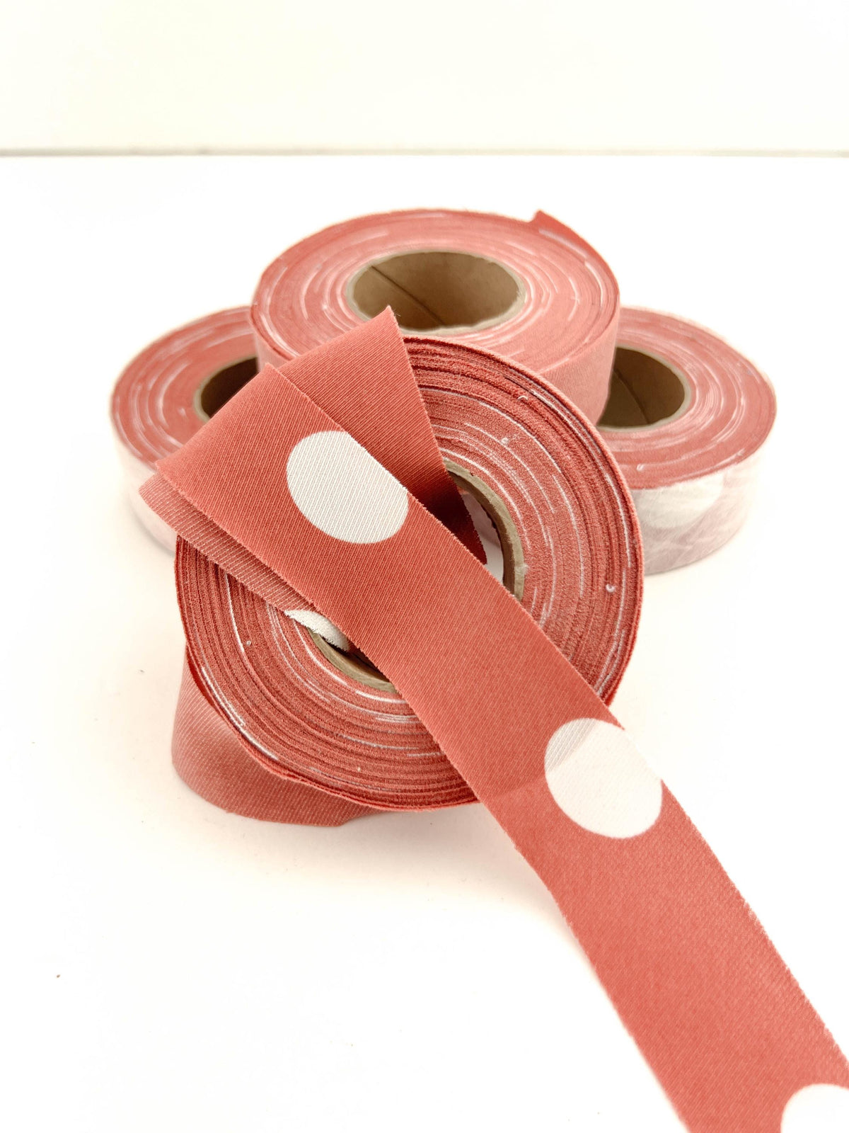 Burnt orange and white polka dot knit bias tape bundle, 4 rolls