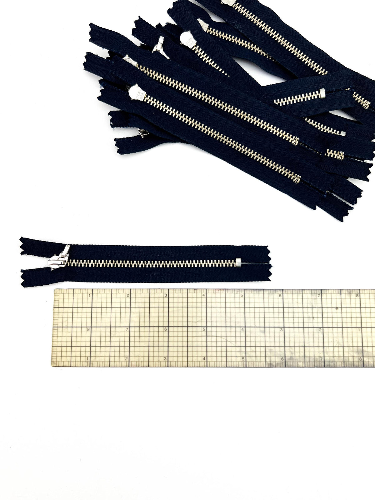 Navy blue 5 inch zippers with nickel metal teeth and no pulls, 13 pack