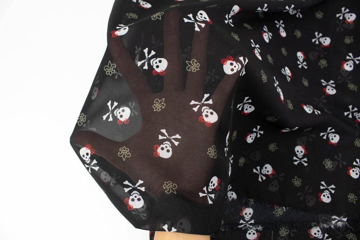Black Skull and Cross Bone Chiffon Fabric by the yard - Felinus Fabrics