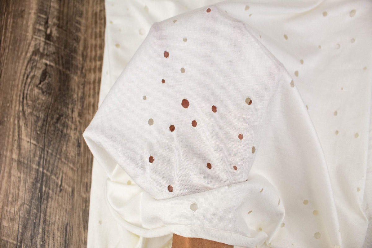 Off White Lasercut Distress Hole Knit Jersey Fabric by the yard ATK00500R - Felinus Fabrics