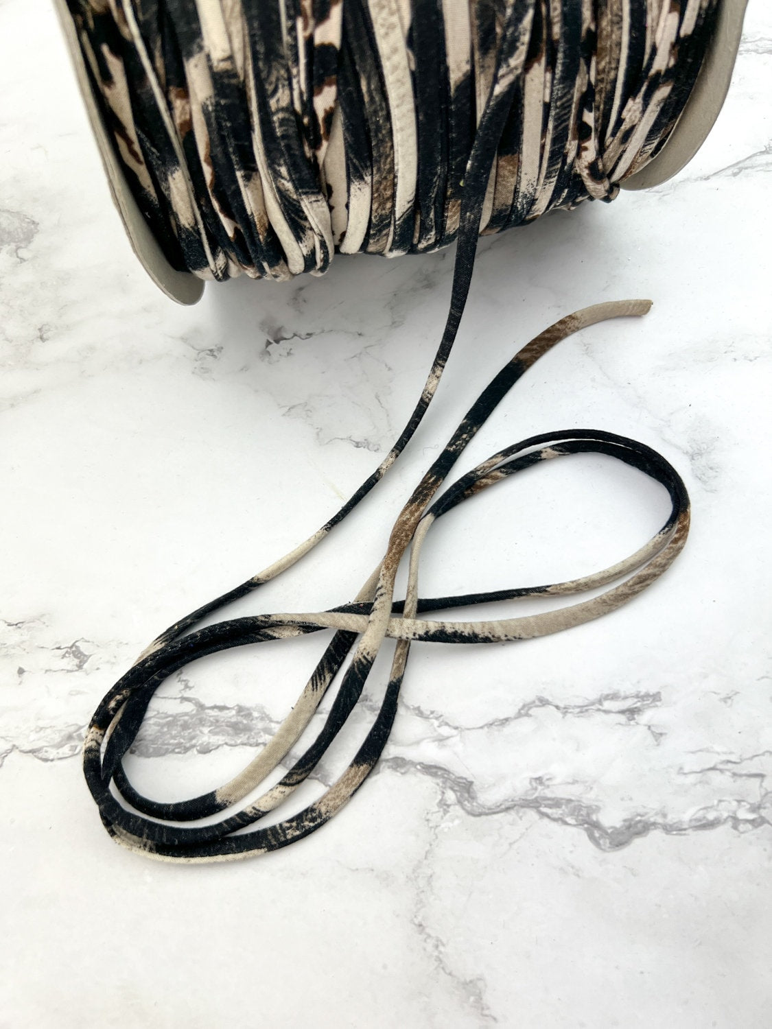 Brown and Black Animal Print Trim Spaghetti Straps Hollow Tube Tubular Trim 10 yards
